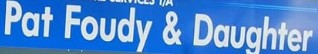 Blue sign with text: Pat Foudy & Daughter indicating a business or service name.